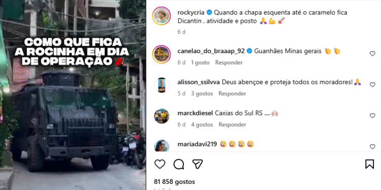 como é ser policial no Rio de Janeiro: Vista da comunidade da Rocinha com moradores circulando, casas em morros densamente ocupados e rotina local sendo exibida enquanto o vídeo mostra a realidade da favela sob o olhar de um ex-policial/influenciador, destacando o cenário urbano e o cotidiano em área de vulnerabilidade social e atuação constante das forças de segurança.