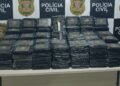 225 kg de cocaína em caminhão em Campinas #PraCegoVer: tabletes de droga apreendidos dentro de compartimento de caminhão durante operação policial.